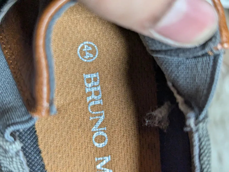 gray slip-on casual shoes by Bruno Marc
