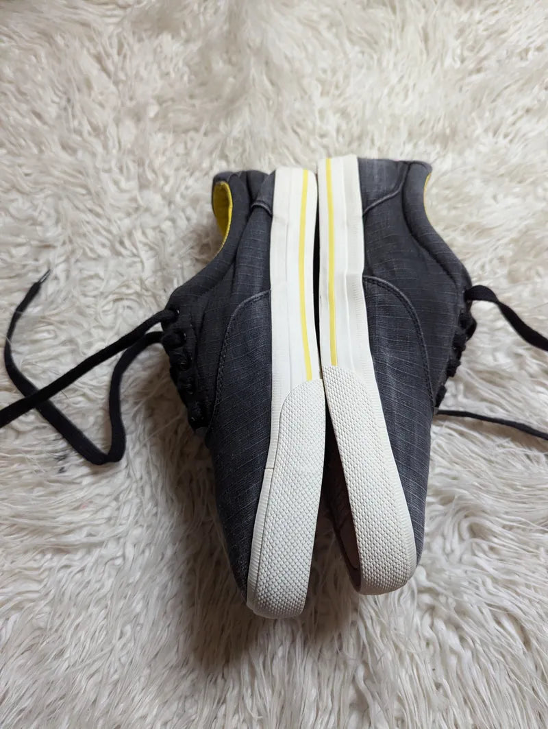 Polo Ralph Lauren Vaughn casual sneakers in dark gray with a bright yellow inner lining