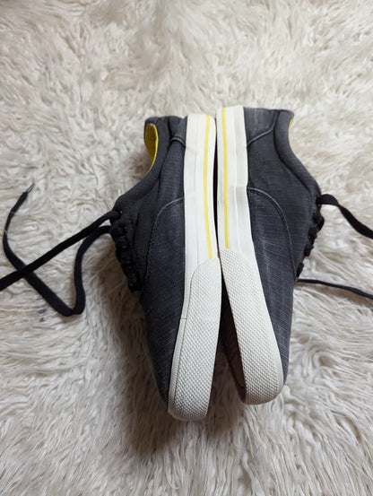 Polo Ralph Lauren Vaughn casual sneakers in dark gray with a bright yellow inner lining