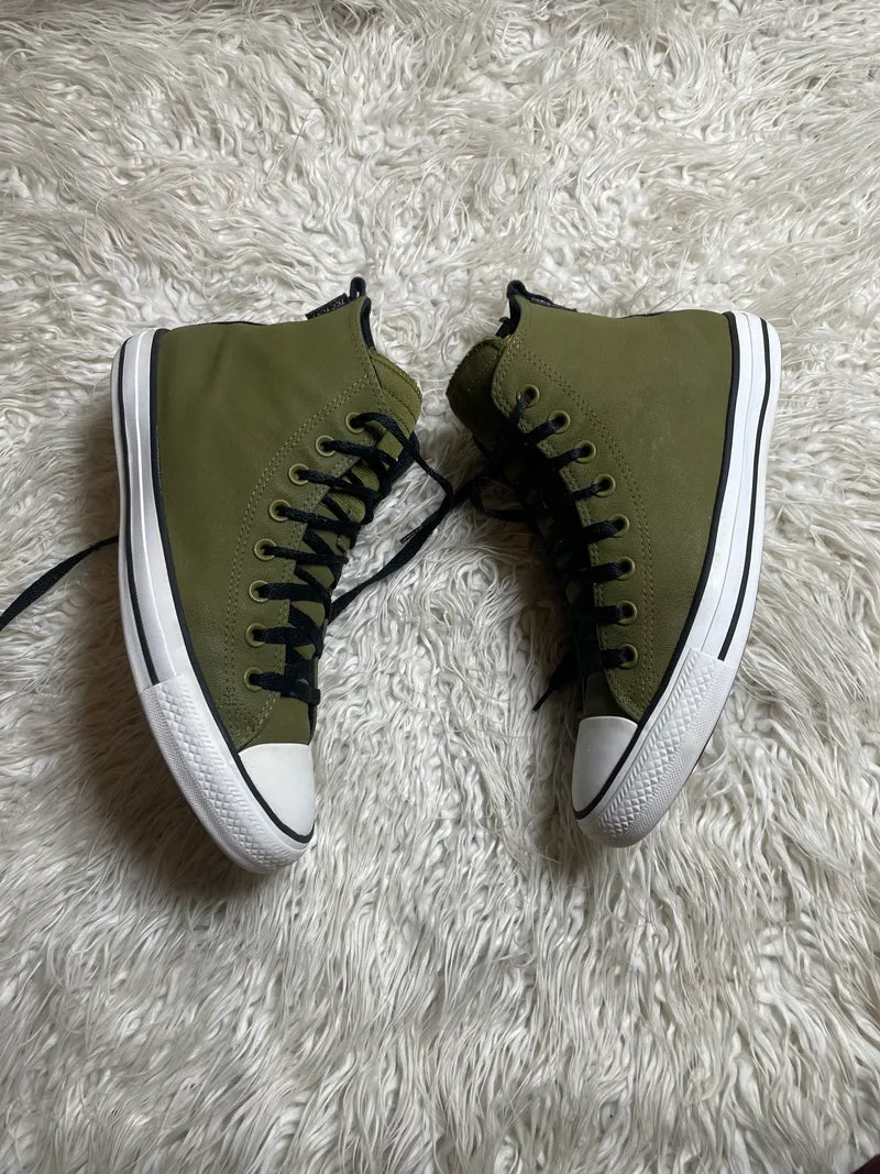 Converse Chuck Taylor All Star TecTuff high-top sneakers in a swamp green or dark moss colorway with black laces and a white rubber sole