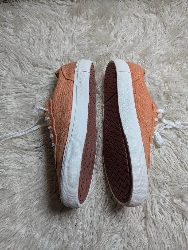 orange canvas low-top sneakers