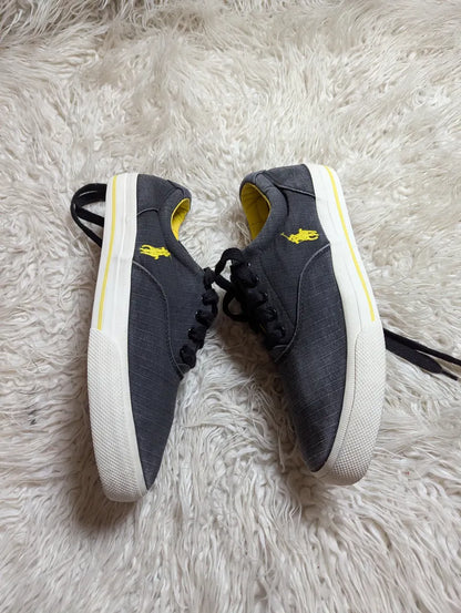 Polo Ralph Lauren Vaughn casual sneakers in dark gray with a bright yellow inner lining