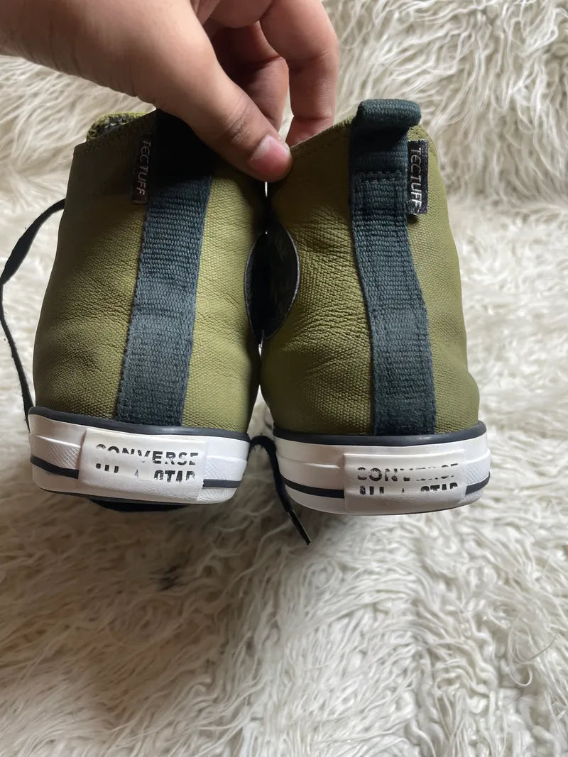 Converse Chuck Taylor All Star TecTuff high-top sneakers in a swamp green or dark moss colorway with black laces and a white rubber sole