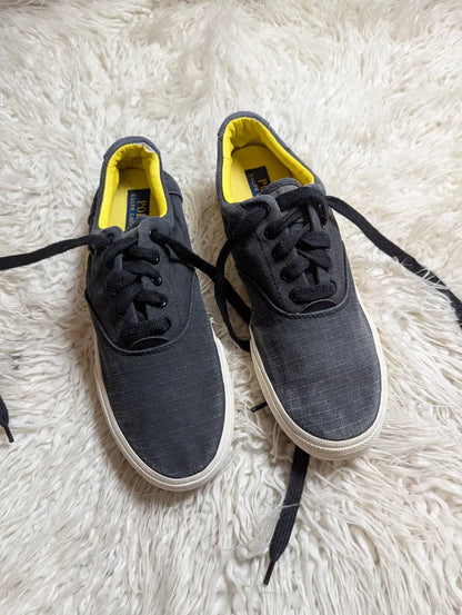 Polo Ralph Lauren Vaughn casual sneakers in dark gray with a bright yellow inner lining